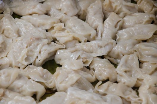 raw food, Chinese dumplings filled with pork 