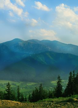 Mountains with green forest landscape.