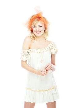 Happy smiling blond lady on a white background. Studio photo