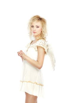 Blond lady with white wings on a white background. Vertical photo