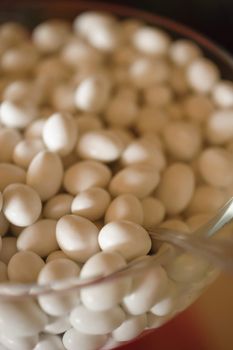 White sugar-covered almond candy for celebrations