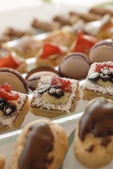 Variety of italian pastry on tray display