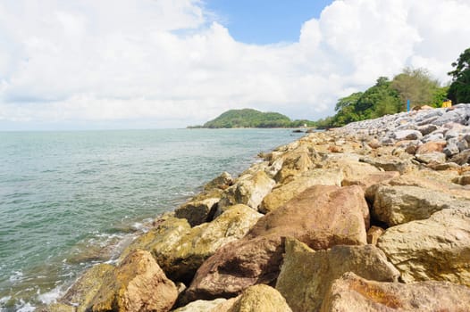 Stone wave barrier near beach in Chanthaburi, Thailand.