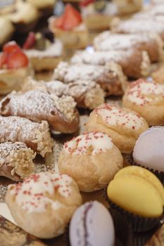 Variety of italian pastry on tray display