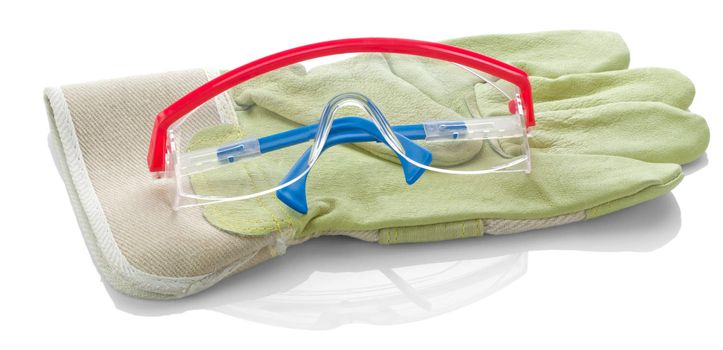glasses on protective glove isolated