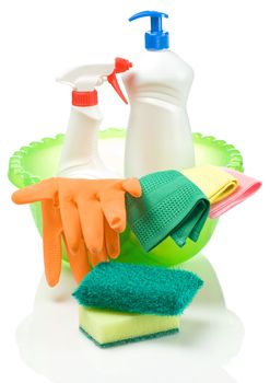 green basin with cleaning articles