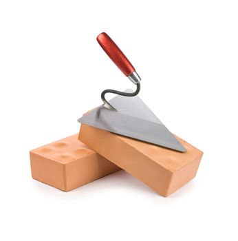 two bricks with trowel