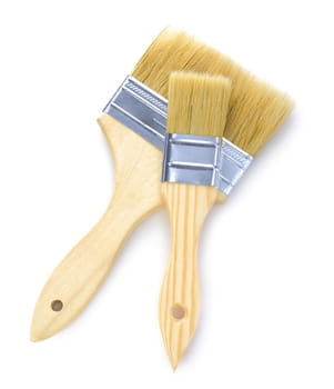 two wooden paintbrushes