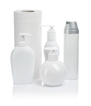 white towel and cosmetical accesories