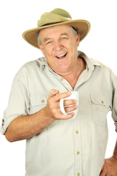 Casual middle aged man in a hat smiling with a cup of coffee.