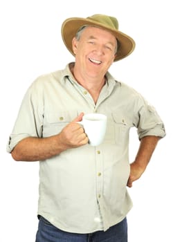 Casual middle aged man in a hat smiling with a cup of coffee.