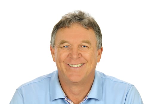 Close up of middle aged casual man smiling and sitting.