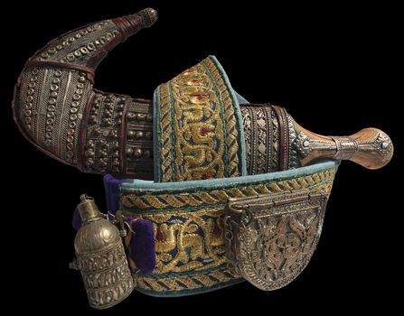 Jambiya or Janbiya - Yemen's curved dagger with typical belt on black background