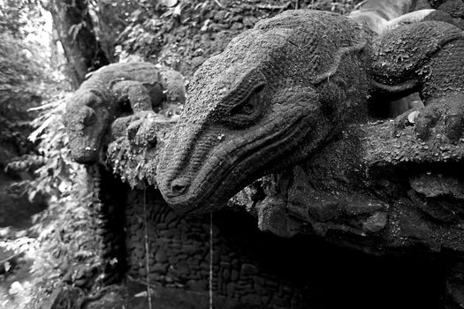Lizards sculptures in the monkey forest, Bali, Indonesia