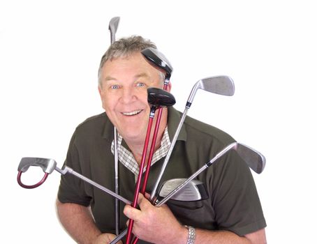 Middle aged golfer holding a bunch of clubs excited about playing.