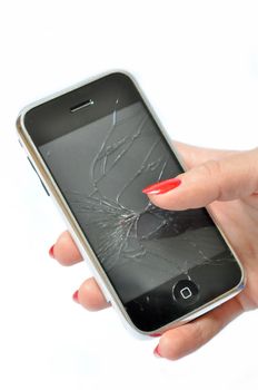 Girl with red nails holding a Mobile phone with broken screen