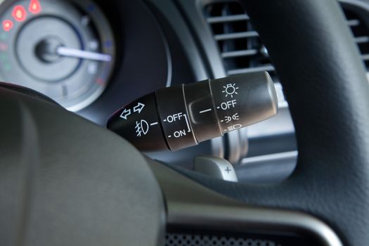 Illuminated dashboard and steering wheel of a modern car