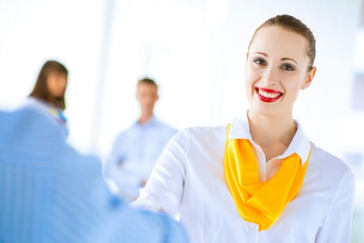 young business woman shaking hands with a client, the agreement between the partners