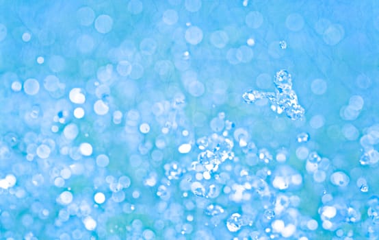 closeup of bubbles in blue water