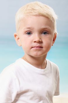 Portrait. Beautiful little boy on the beach