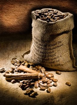 small coffee sack vith cinnamon and copy space