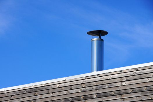 Vents of ventilation are located on a roof of a  building