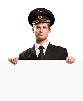 pilot in the form of holding a blank banner isolated on white background