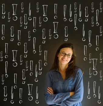 Businesswoman, student or teacher with chalk exclamation marks on blackboard background
