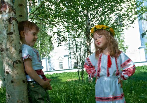  Russian Little boy and girl  on a orthodox church background