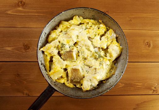 	farm-style 	country Codfish with potatoes and onions baked