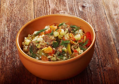 boiled pearl barley with meat and vegetable .farm-style 	country