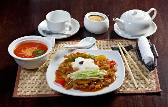 Chinese food style.lunch tomato soup puree and pork with vegetable