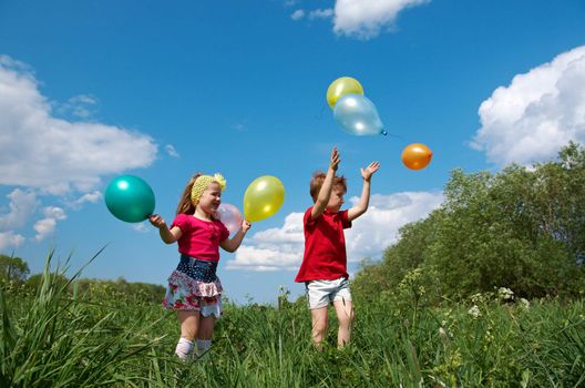 children with balloon outdoor