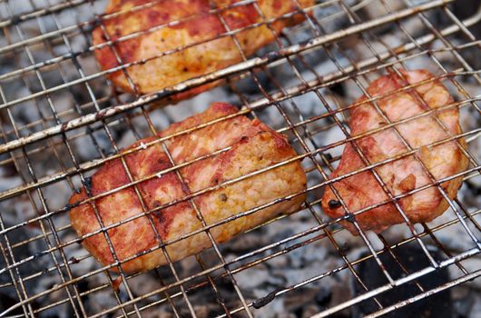 Sirloin steak prepared on the barbecue grill.  Shallow depth-of-field.