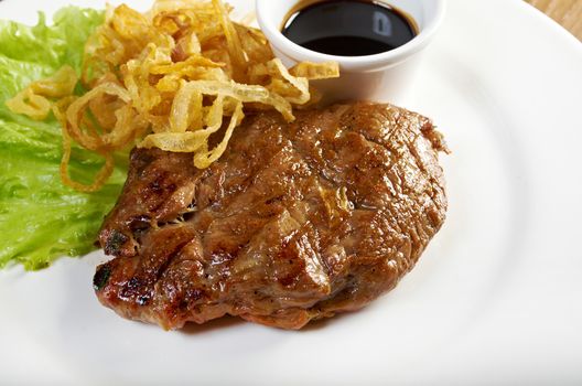 grilled t-bone  beef steak and vegetables