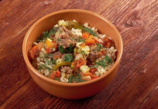 boiled pearl barley with meat and vegetable .farm-style 	country