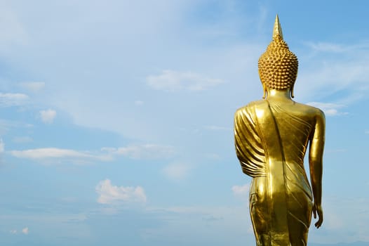Buddha standing on a mountain Wat Phra That Khao Noi, Nan Province, Thailand