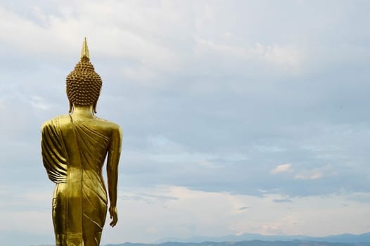 buddha standing on a mountain Wat Phra That Khao Noi, Nan Province, Thailand