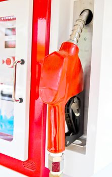 Colorful fuel oil gasoline dispenser at petrol filling station