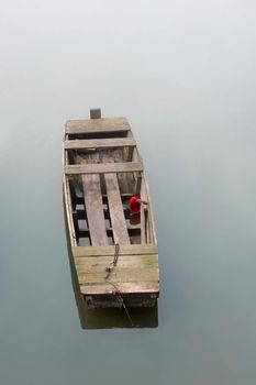 Old fishing boat on water