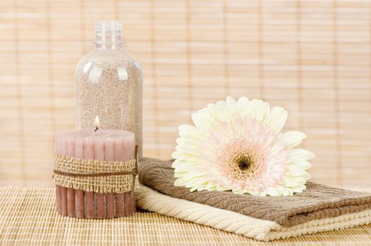 Spa set of 2 towels, flower, candle and aromatic sand ready for use 