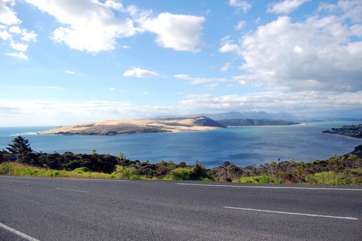 Sea bay view from asphalt road, North Island, New Zealand