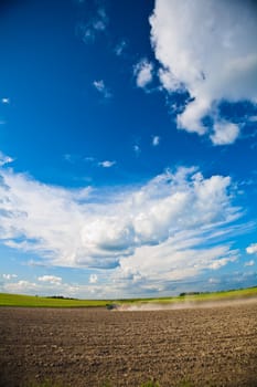field sky tractor