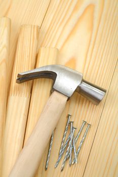 hammer on planks and nails