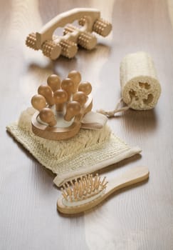 massager with bath sponge and hairbrush