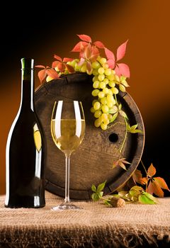 still life of wine barrel glass grape composition