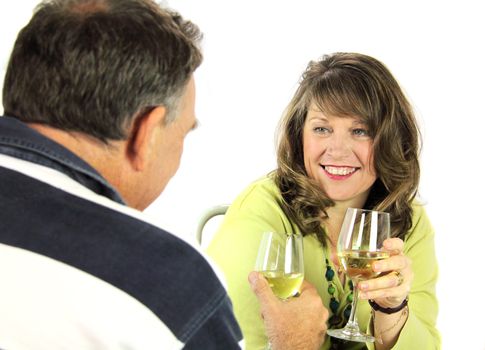 Middle aged couple having a conversation over lunch.