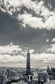 Taipei cityscape with dramatic clouds at sky, infrared photography in black and white.