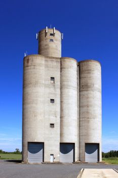 vertical photo of silos for grain storage for agriculture