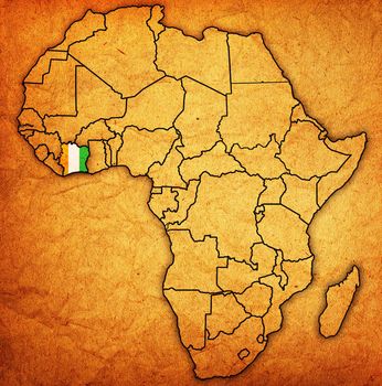 ivory coast on actual vintage political map of africa with flags